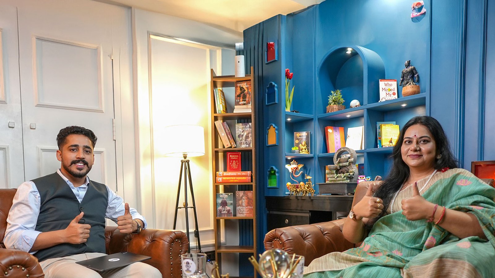 Podcast Growth in Tier 2 Cities India: Jaipur Goes Hindi-First 3 Oskillo Studio Best Podcast Studio for Rent in Jaipur Two armchairs on a blue and white set ready for a Hindi video podcast interview in Jaipur