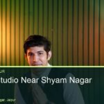 Green panel wall set at Oskillo Studio, Vaishali Nagar, Jaipur, with a single speaker and floor lamp